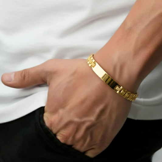 Man wearing Empire gold bracelet for men with formal outfit